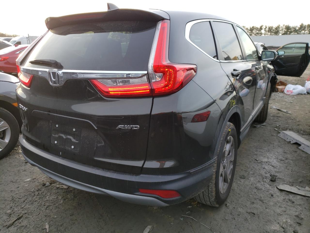 Photo 4 from auction – 2017 HONDA CR-V EXL with VIN 2HKRW2H80HH671565