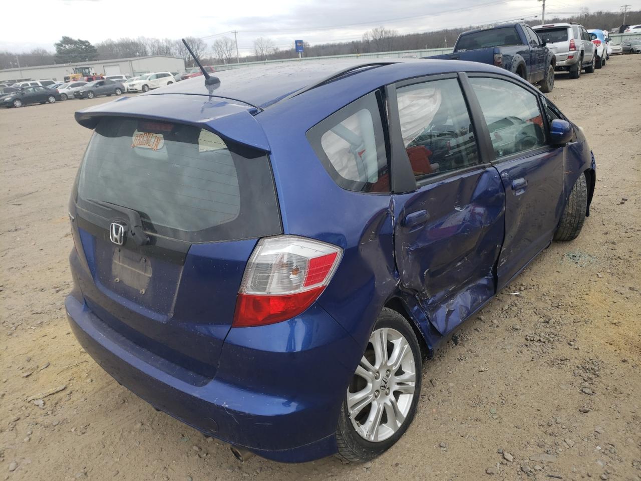 Photo 4 from auction – 2009 HONDA FIT with VIN JHMGE88419C000931