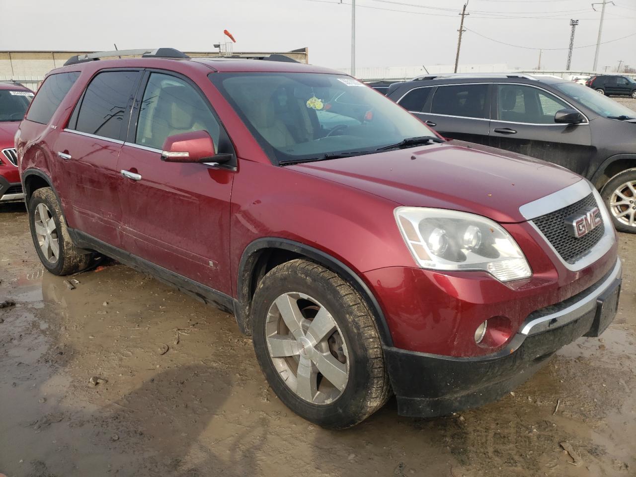 GMC ACADIA SLT 2010 with VIN 1GKLRMEDXAJ106963 - Photo from auction