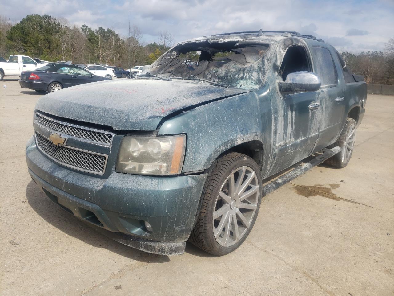 Photo 2 from auction – 2011 CHEVROLET AVALANCHE with VIN 3GNTKEE38BG231998