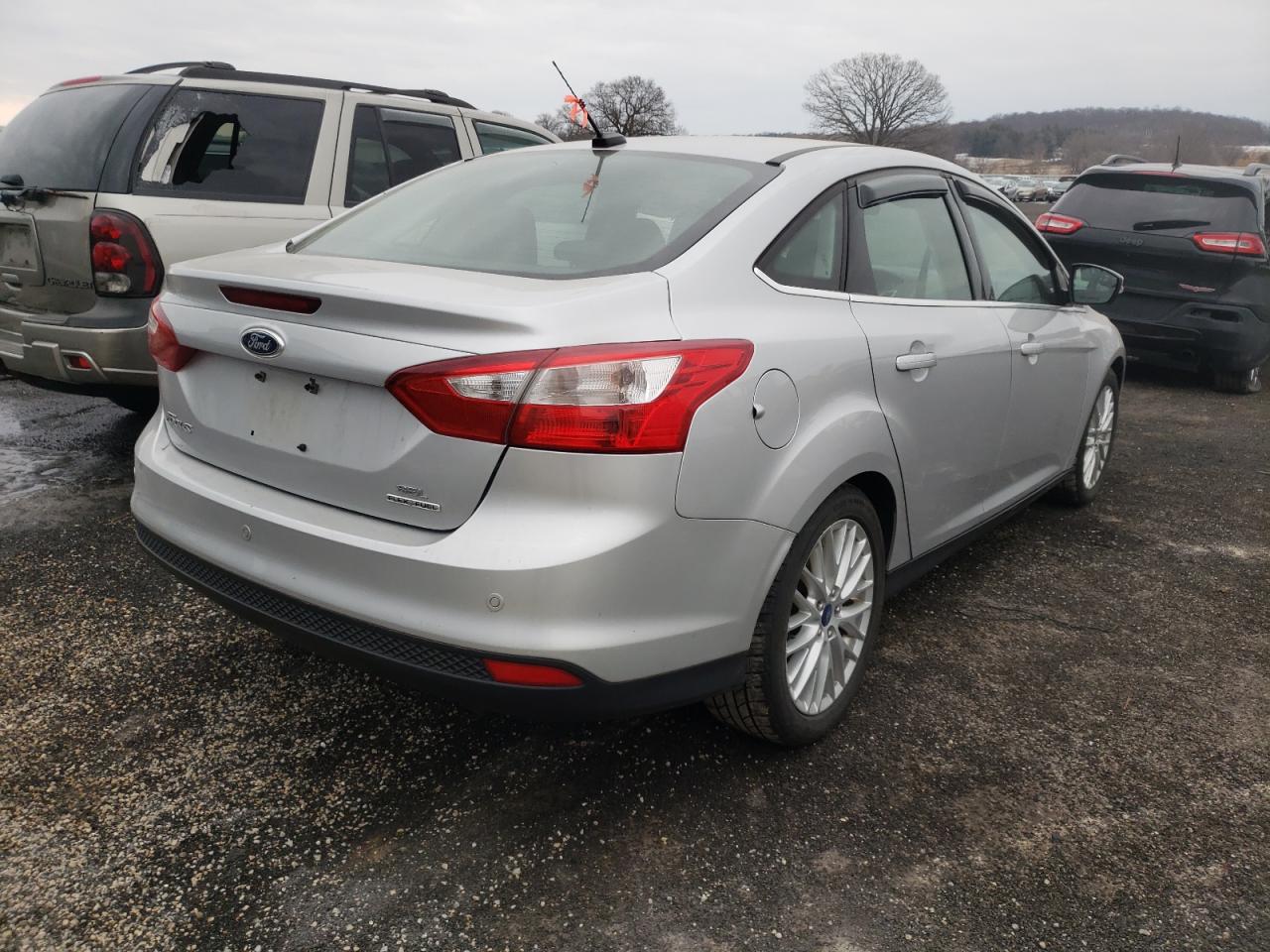 Photo 4 from auction – 2012 FORD FOCUS SEL with VIN 1FAHP3H21CL410952