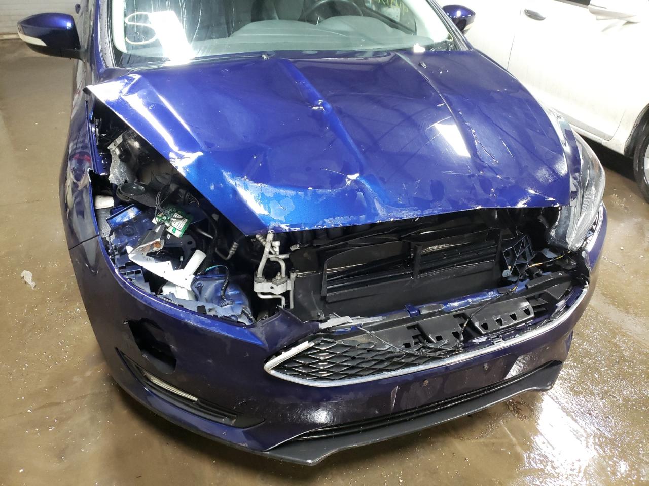 Photo 9 from auction – 2016 FORD FOCUS SE with VIN 1FADP3F24GL299093
