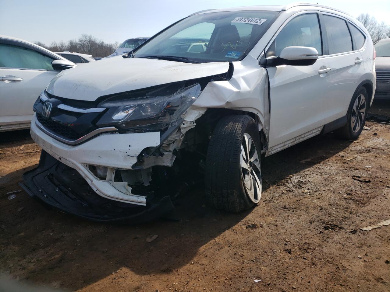 Photo 9 from auction – 2016 HONDA CR-V TOURI with VIN 5J6RM4H99GL011698