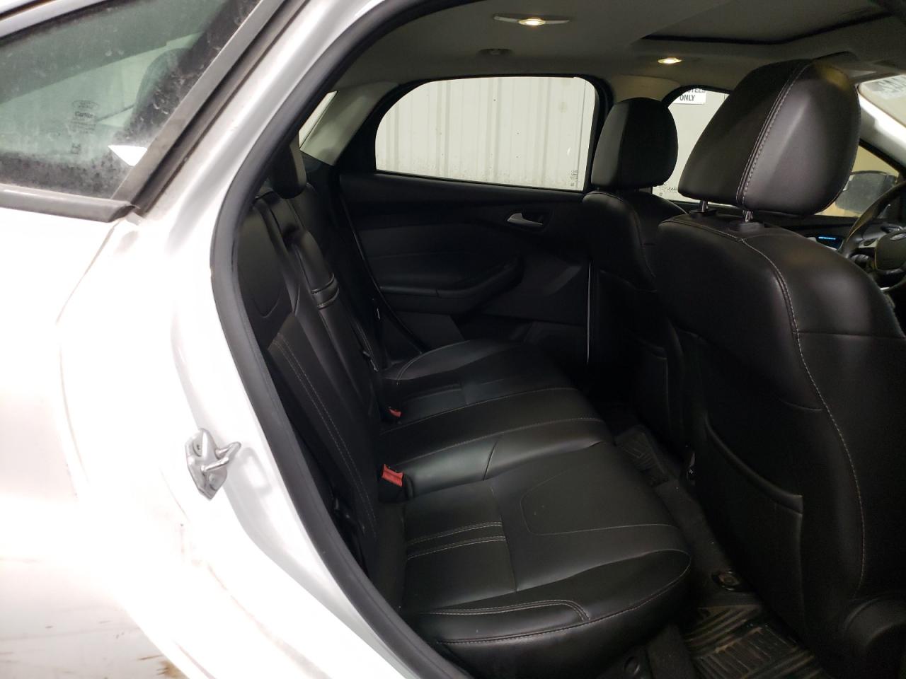 Foto 6 de la subasta – 2013 FORD FOCUS SE con VIN 1FADP3F27DL275642