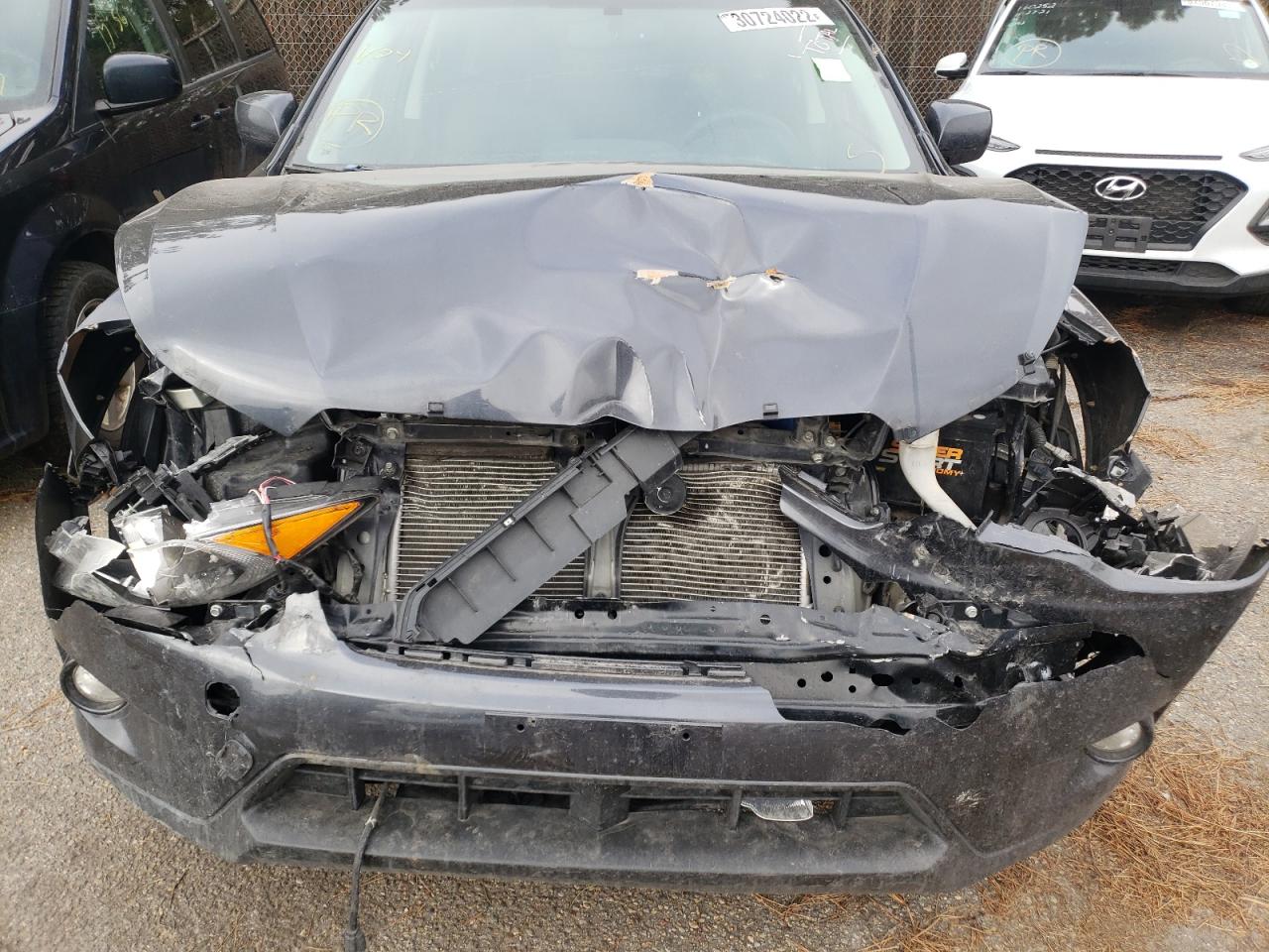 Photo 7 from auction – 2014 SUBARU XV CROSSTR with VIN JF2GPAGC6E8206577