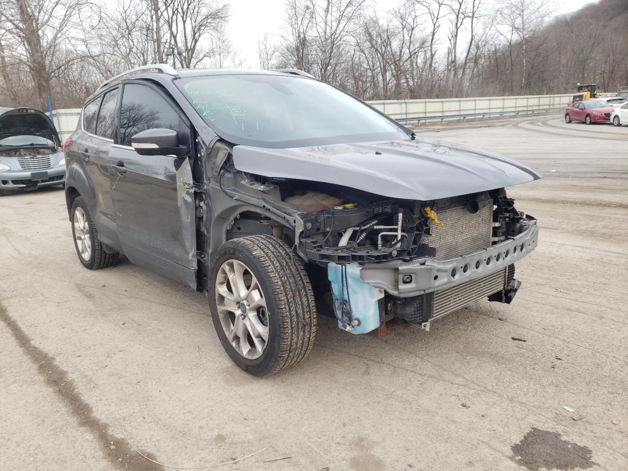 FORD ESCAPE TIT 2015 with VIN 1FMCU9J95FUA58802 - Photo from auction