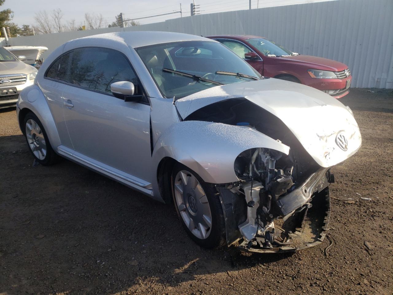 VOLKSWAGEN BEETLE 2012 with VIN 3VWJP7AT0CM658613 - Photo from auction