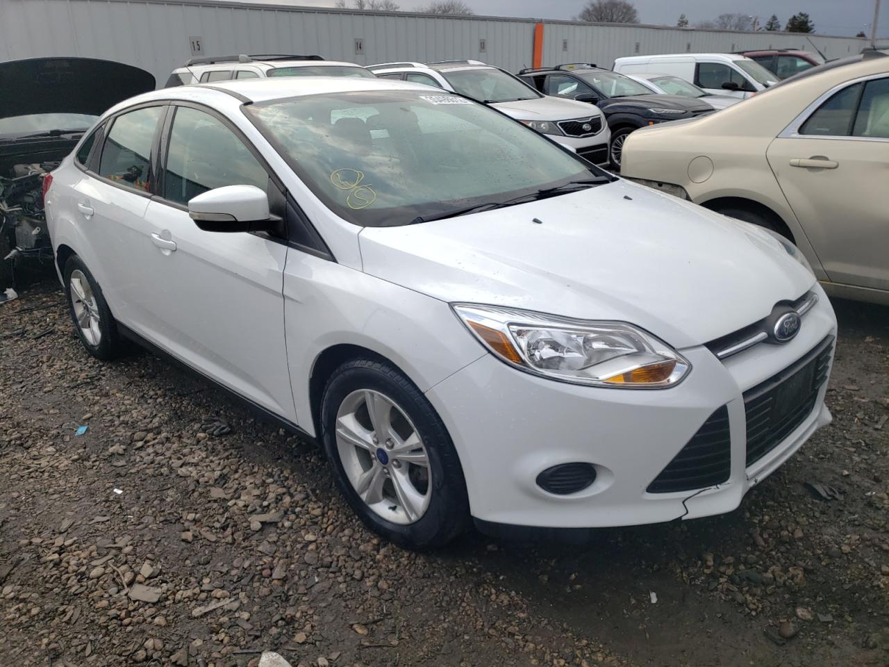 FORD FOCUS SE 2014 with VIN 1FADP3F28EL373998 - Photo from auction