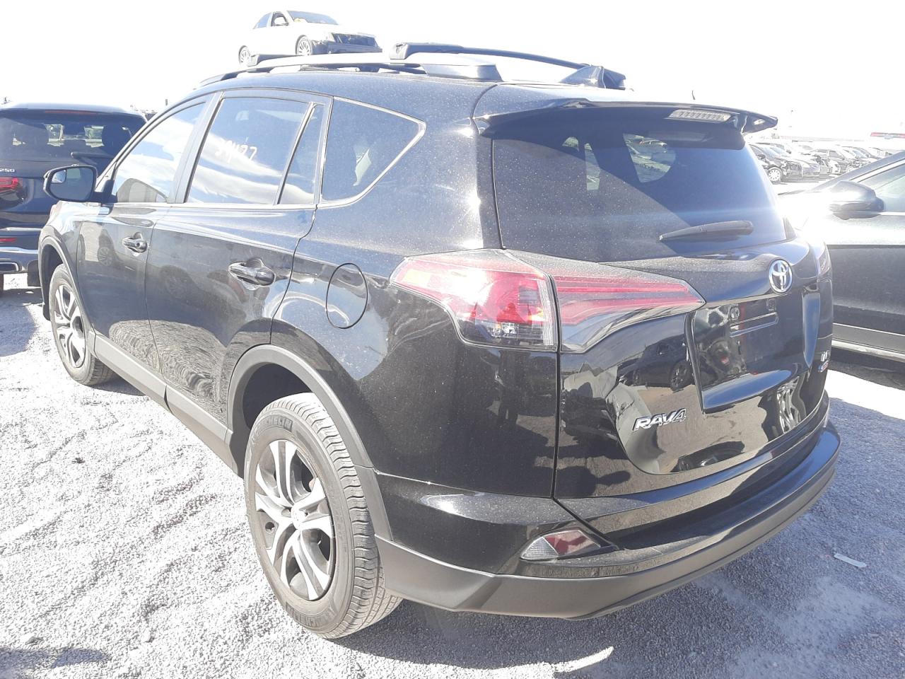 Photo 3 from auction – 2018 TOYOTA RAV4 LE with VIN 2T3ZFREV8JW414431