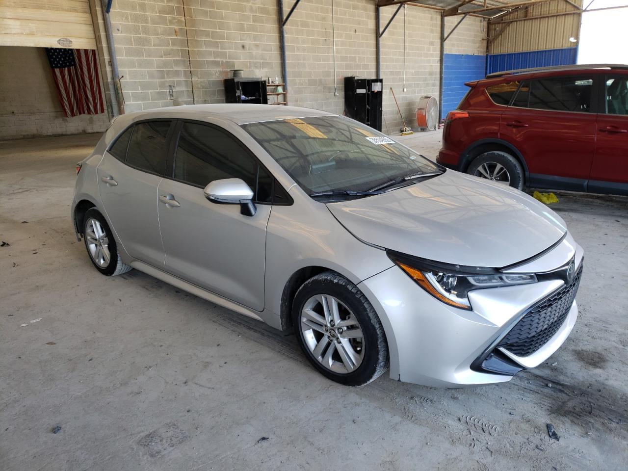 TOYOTA COROLLA SE 2019 with VIN JTNK4RBE8K3060194 - Photo from auction
