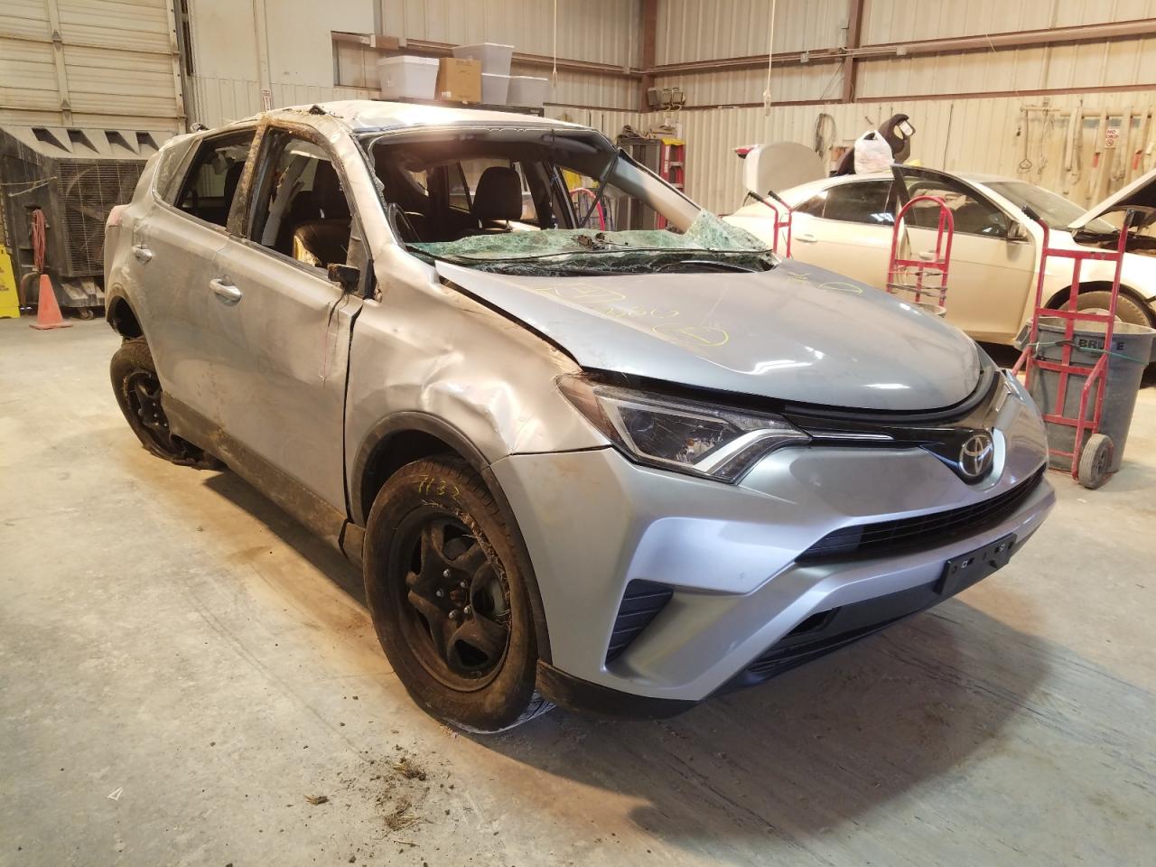 TOYOTA RAV4 LE 2018 with VIN 2T3BFREV2JW701605 - Photo from auction