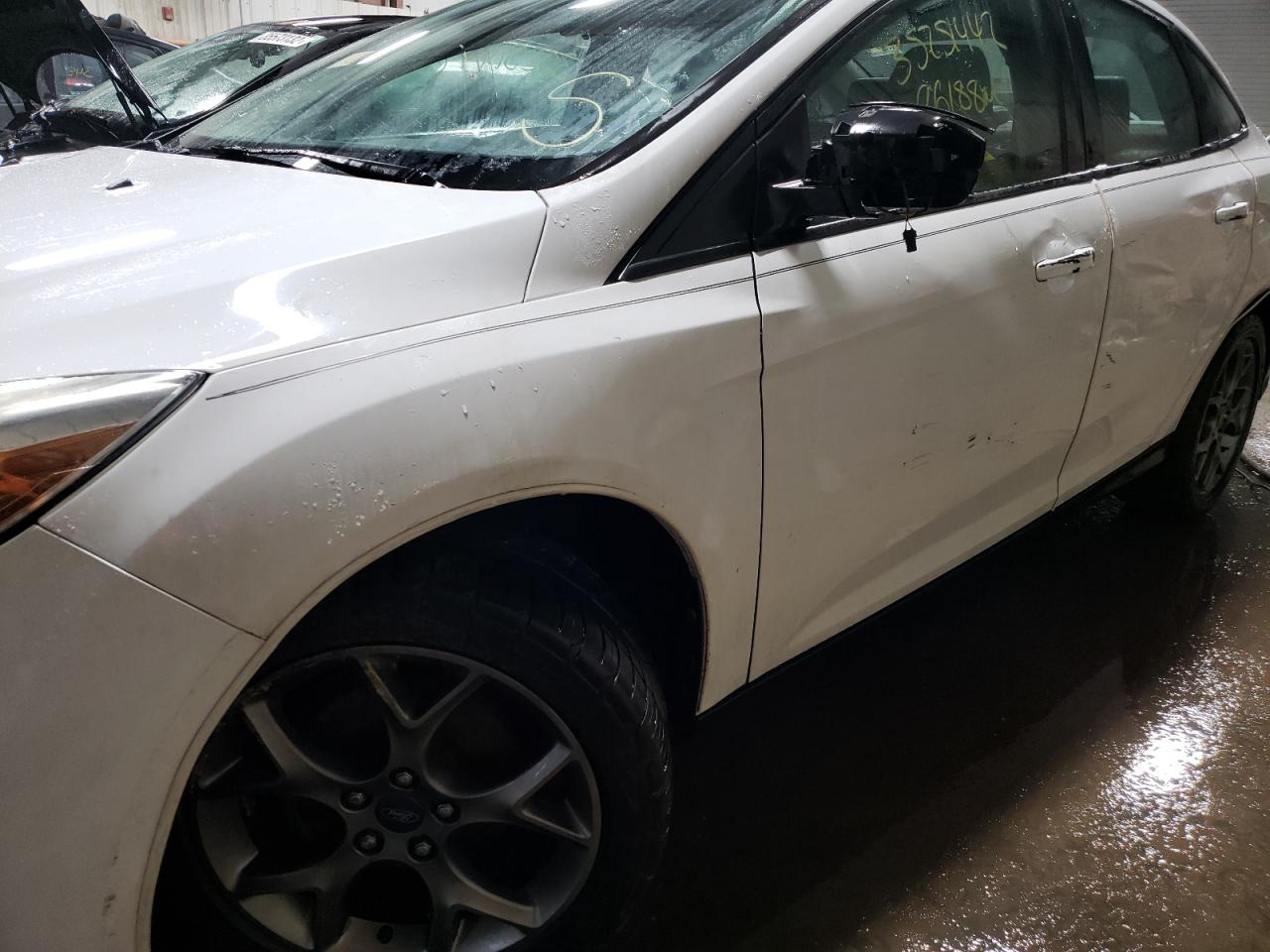 Photo 9 from auction – 2013 FORD FOCUS SE with VIN 1FADP3F27DL275642