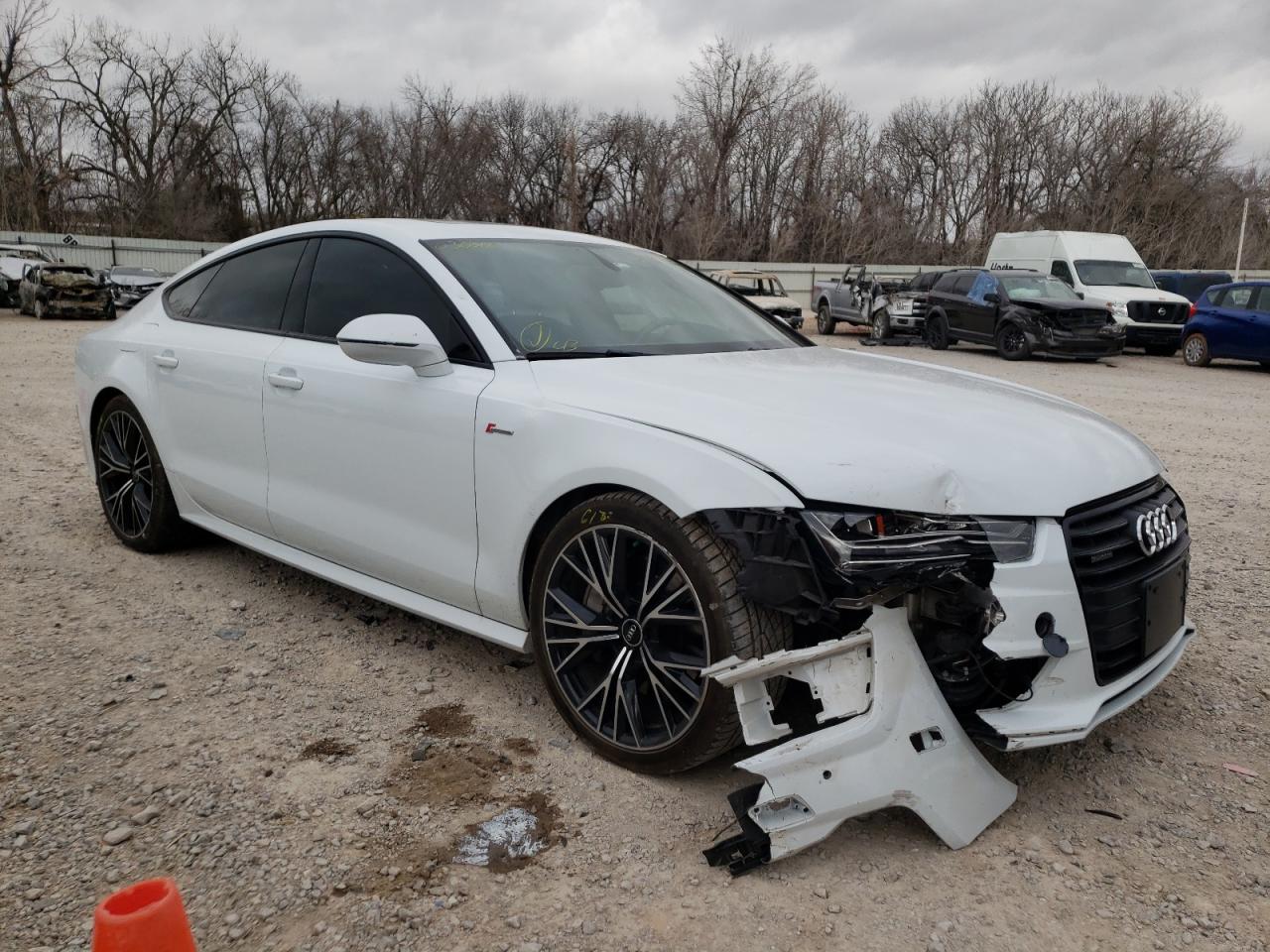 AUDI A7 PREMIUM 2016 with VIN WAUWGAFC3GN030360 - Photo from auction