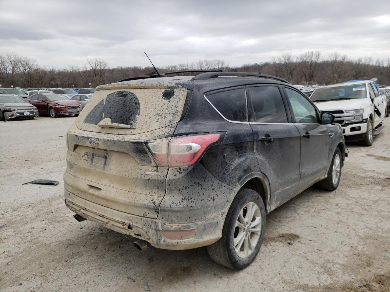 Photo 4 from auction – 2017 FORD ESCAPE SE with VIN 1FMCU9GD3HUD69448