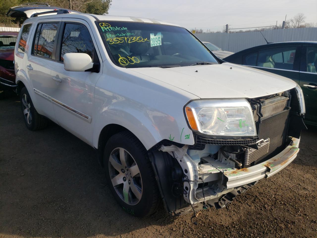 HONDA PILOT TOUR 2012 with VIN 5FNYF4H92CB082718 - Photo from auction