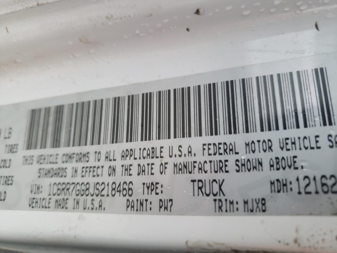 Photo 10 from auction – 2018 RAM 1500 SLT with VIN 1C6RR7GG8JS218466