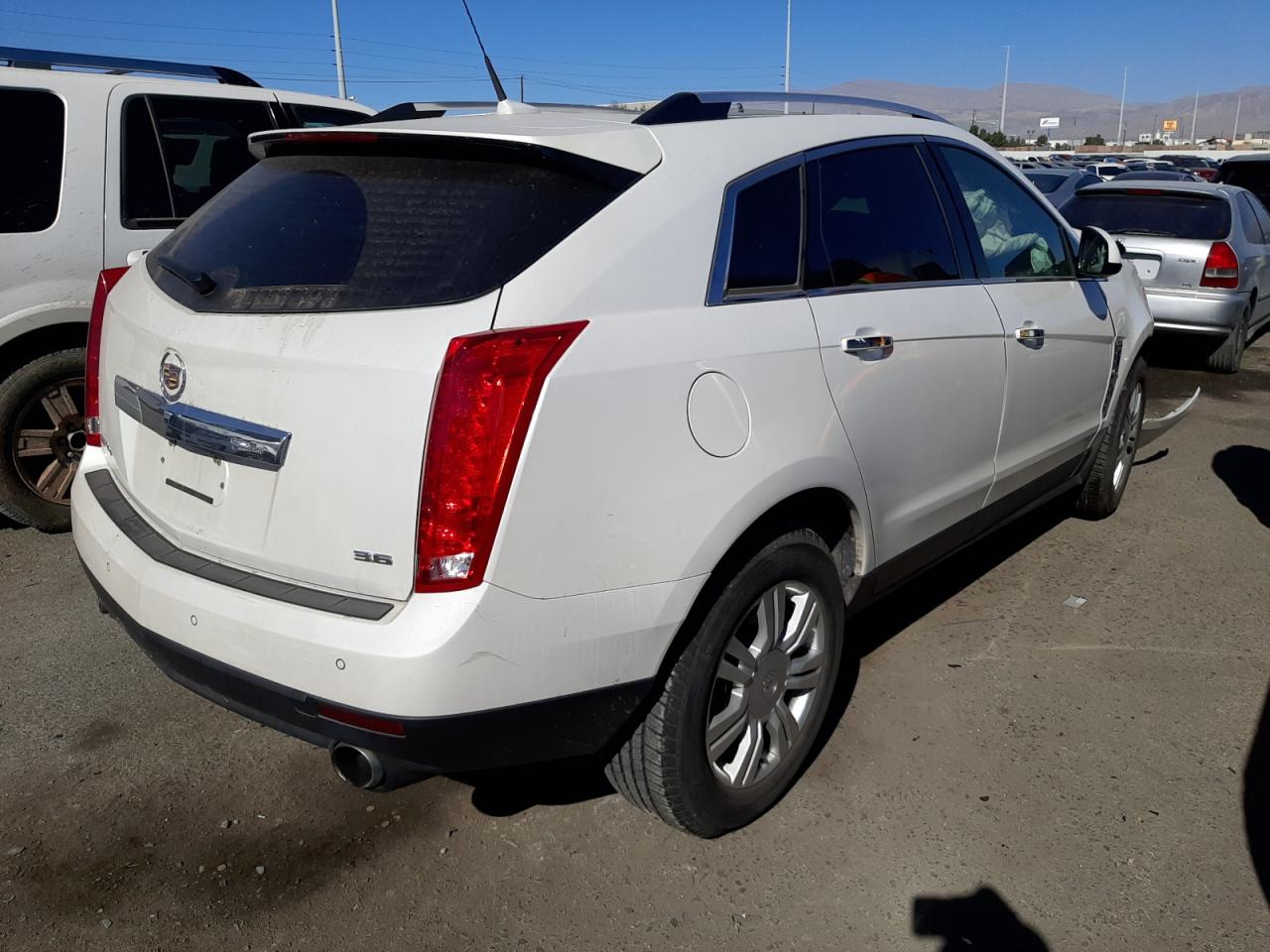 Photo 4 from auction – 2012 CADILLAC SRX LUXURY with VIN 3GYFNDE33CS606258