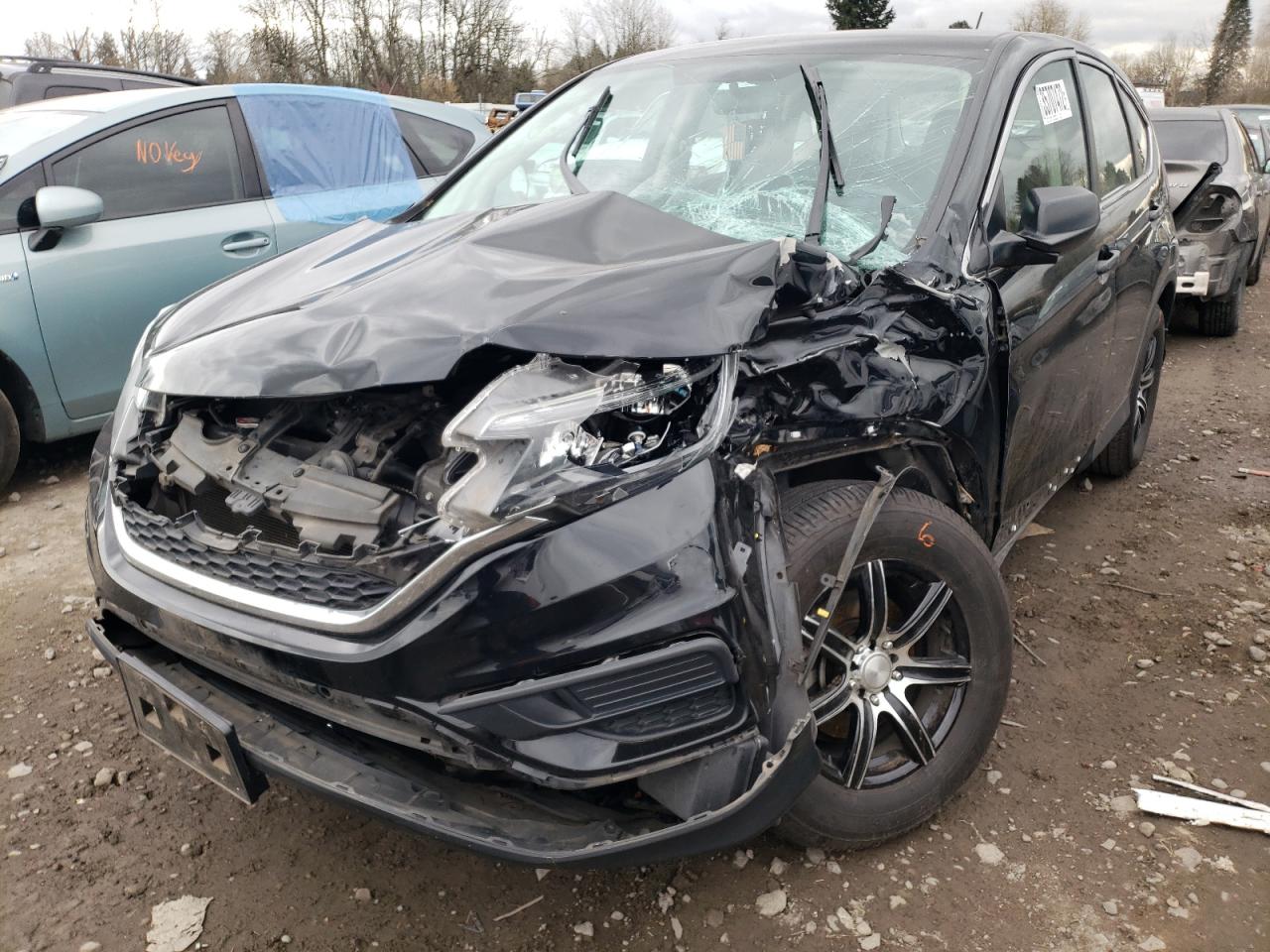 Photo 2 from auction – 2016 HONDA CR-V LX with VIN 2HKRM4H32GH613638