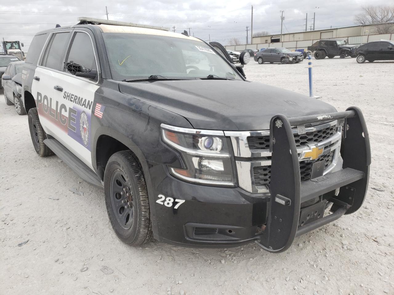 CHEVROLET TAHOE POLI 2015 with VIN 1GNLC2EC8FR258734 - Photo from auction