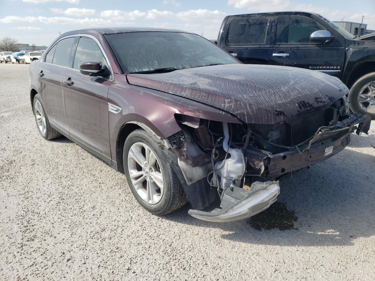 FORD TAURUS SEL 2018 with VIN 1FAHP2E83JG105560 - Photo from auction