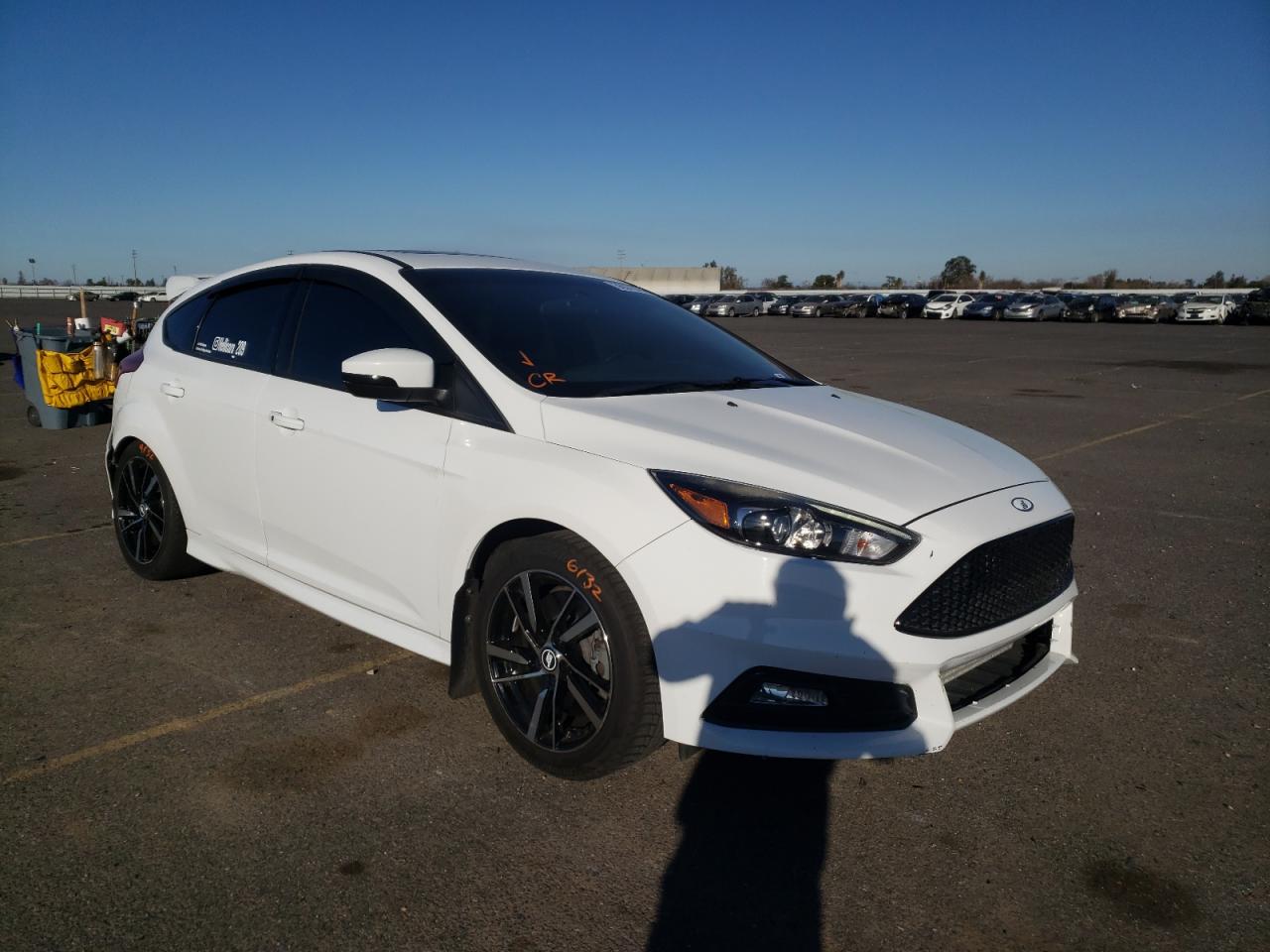 FORD FOCUS ST 2016 with VIN 1FADP3L94GL306481 - Photo from auction