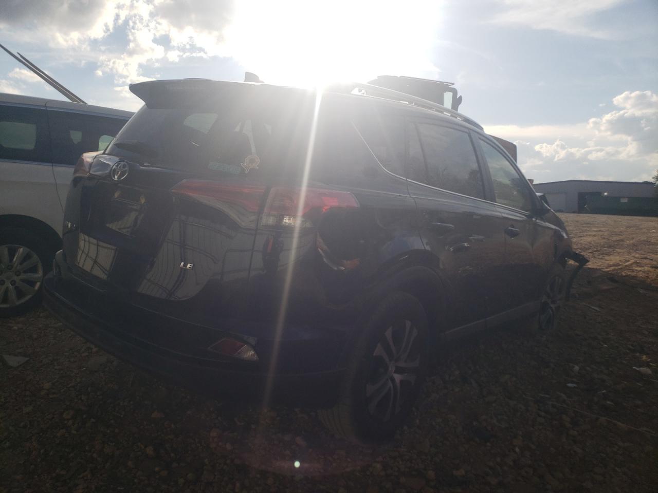 Photo 4 from auction – 2017 TOYOTA RAV4 LE with VIN JTMZFREV4HJ715304
