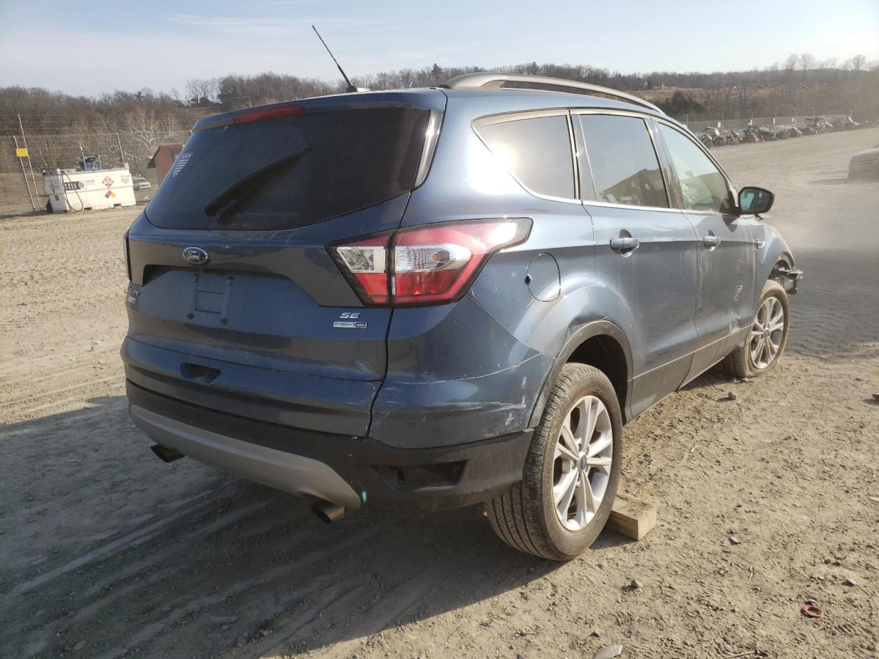 Photo 4 from auction – 2018 FORD ESCAPE SE with VIN 1FMCU9GD3JUC84079