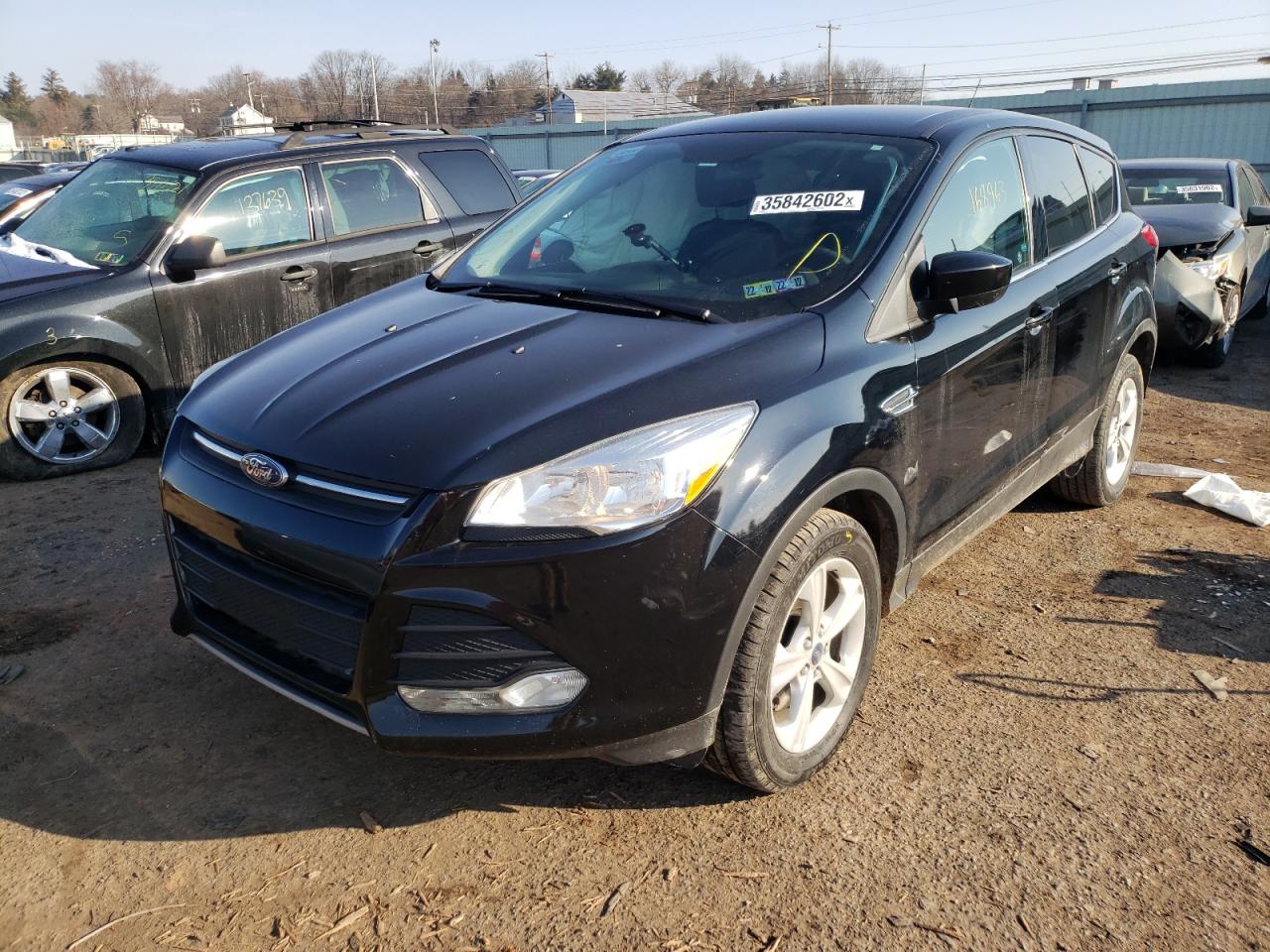 Photo 2 from auction – 2016 FORD ESCAPE SE with VIN 1FMCU9GXXGUA16598