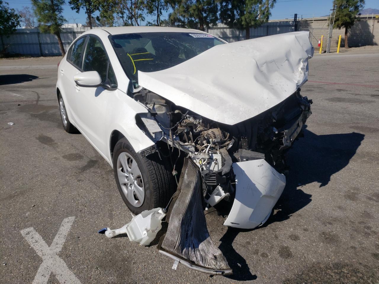 KIA FORTE LX 2018 with VIN 3KPFK4A77JE256619 - Photo from auction