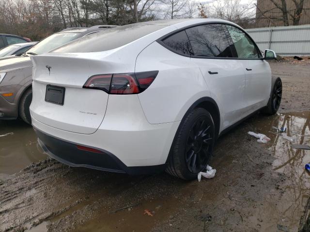 Photo 4 from auction – 2021 TESLA MODEL Y with VIN 5YJYGAEE0MF142929