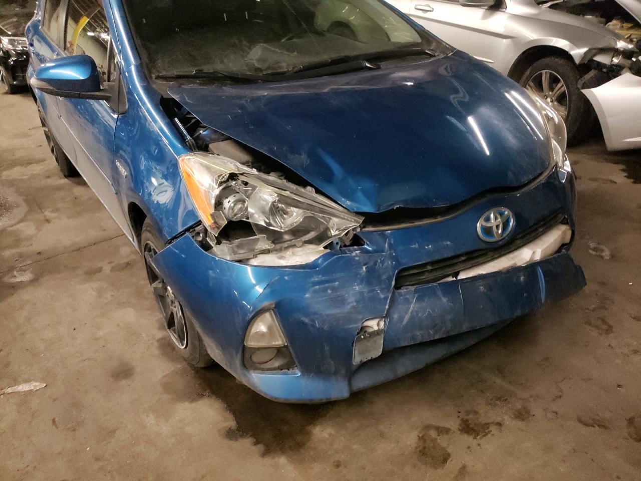Photo 9 from auction – 2014 TOYOTA PRIUS C with VIN JTDKDTB33E1569612