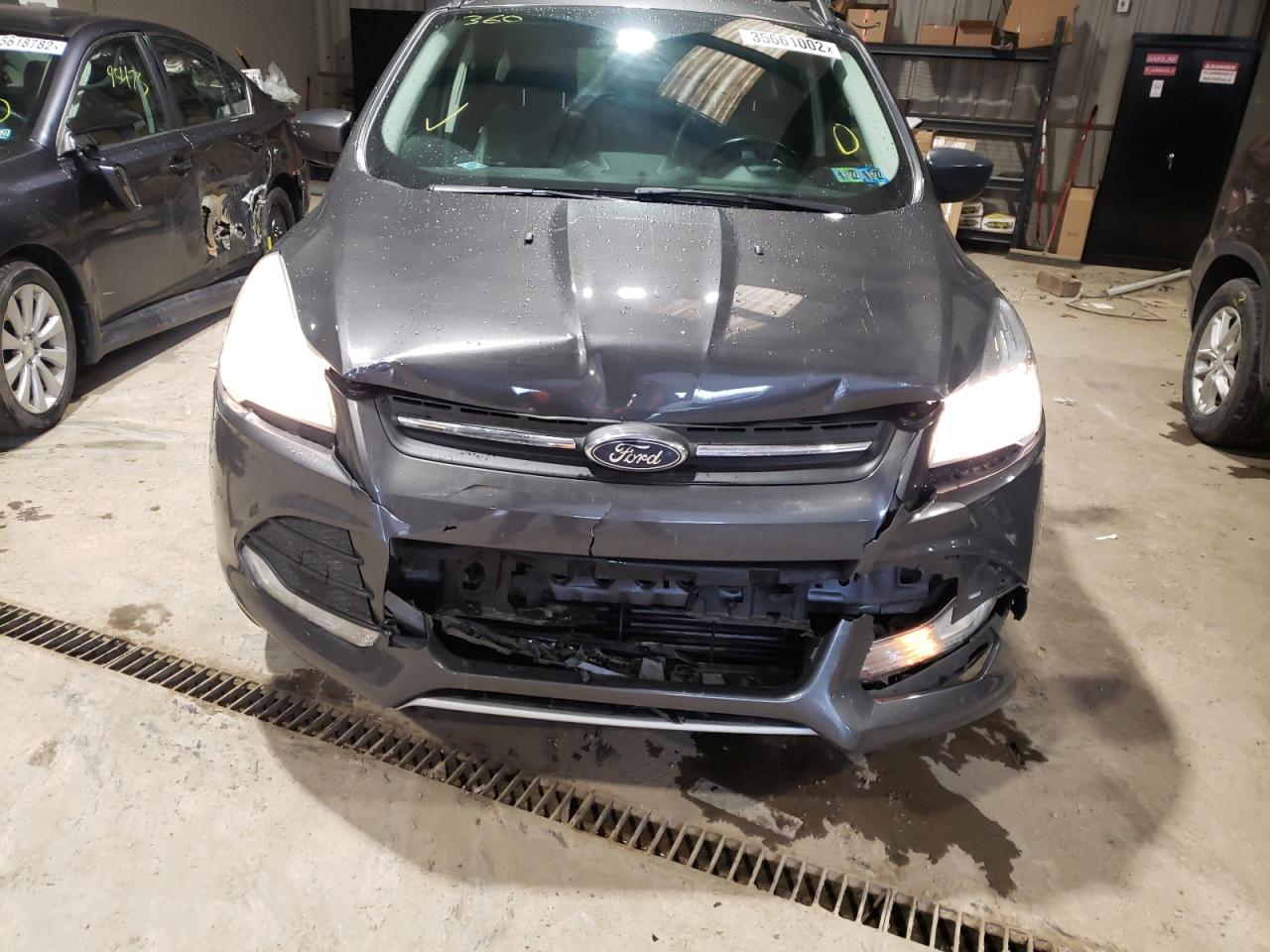 Photo 9 from auction – 2015 FORD ESCAPE SE with VIN 1FMCU9GX3FUA02234
