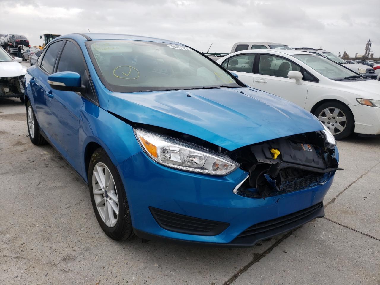 FORD FOCUS SE 2017 with VIN 1FADP3F20HL227521 - Photo from auction
