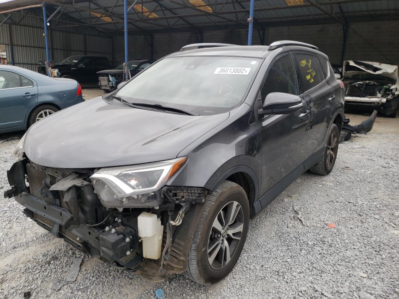 Photo 2 from auction – 2017 TOYOTA RAV4 XLE with VIN JTMWFREV8HD094148