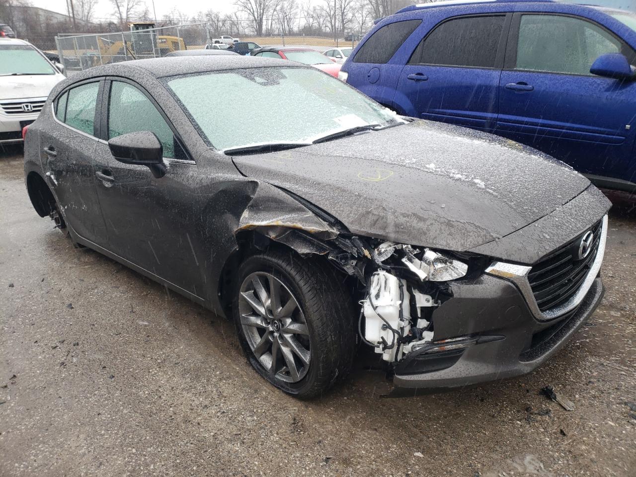 MAZDA 3 TOURING 2018 with VIN 3MZBN1L35JM165334 - Photo from auction