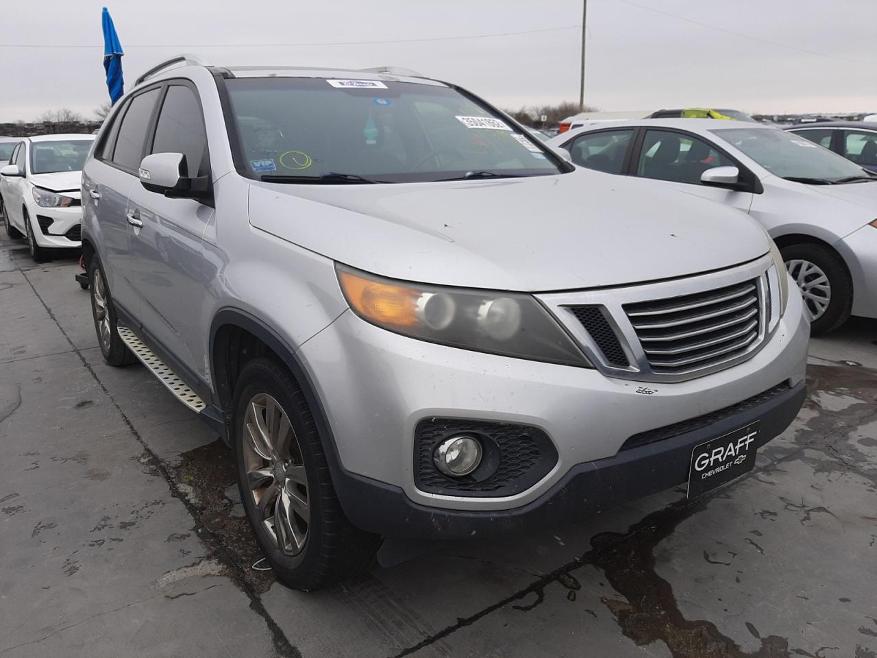 KIA SORENTO EX 2011 with VIN 5XYKU4A2XBG126495 - Photo from auction