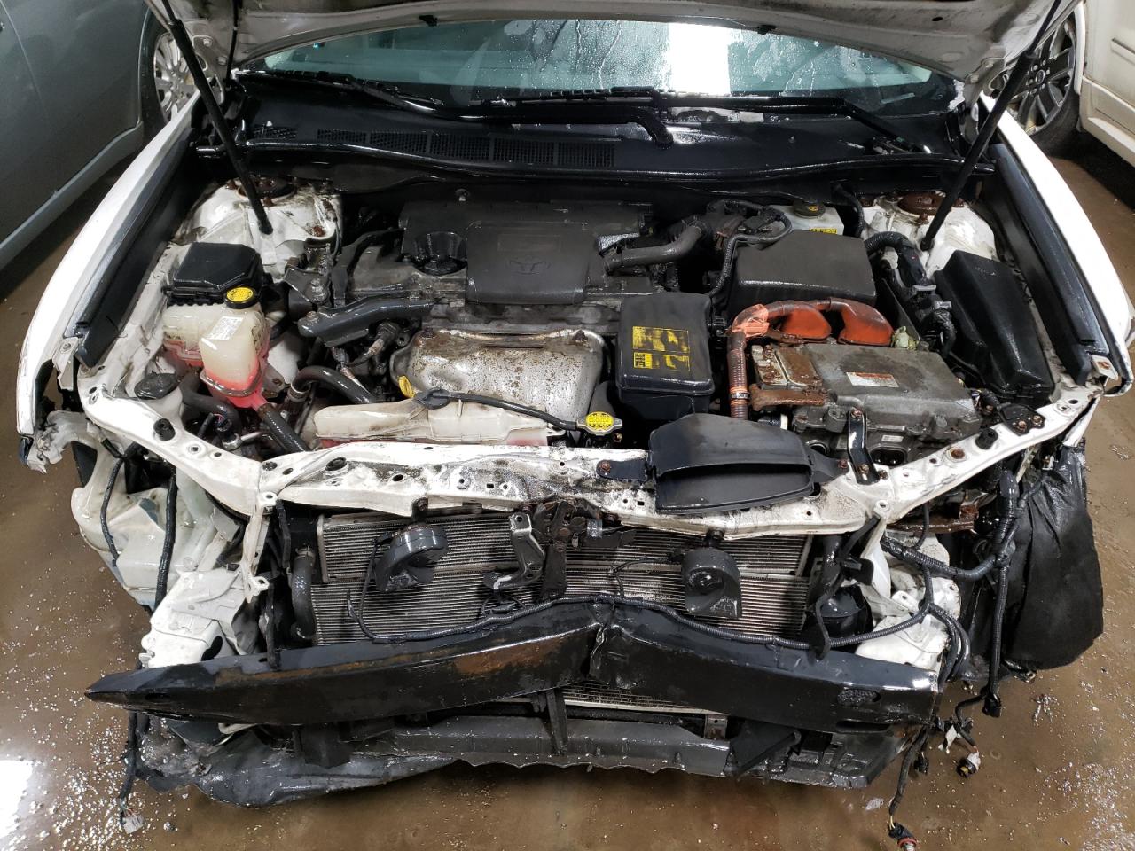 Photo 11 from auction – 2012 TOYOTA CAMRY HYBR with VIN 4T1BD1FK4CU027870