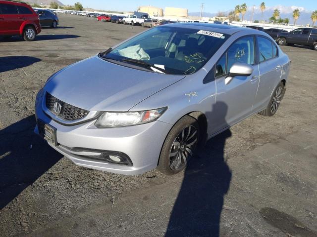 Photo 2 from auction – 2014 HONDA CIVIC EXL with VIN 2HGFB2F95EH517529
