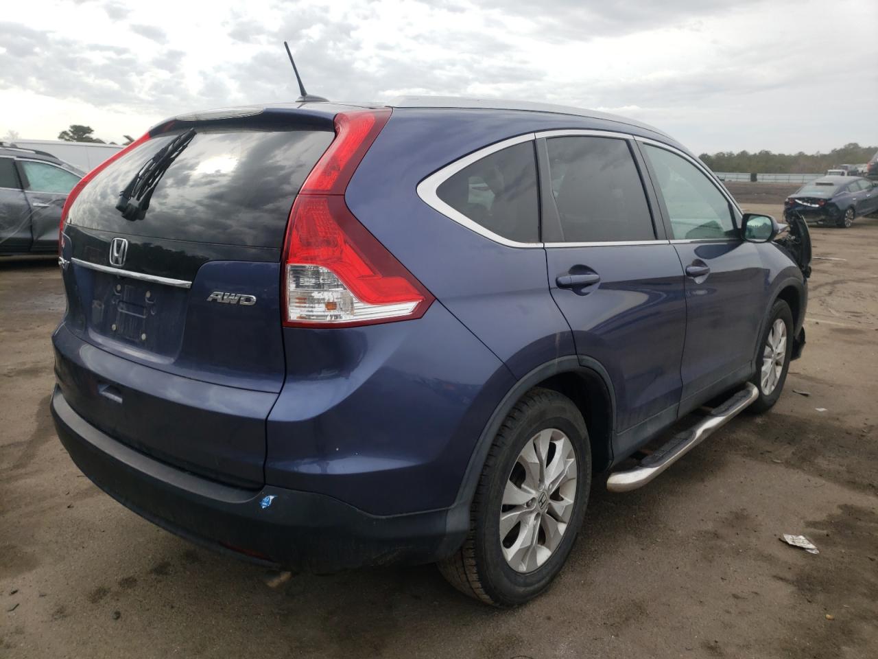 Photo 4 from auction – 2014 HONDA CR-V EXL with VIN 2HKRM4H77EH701164