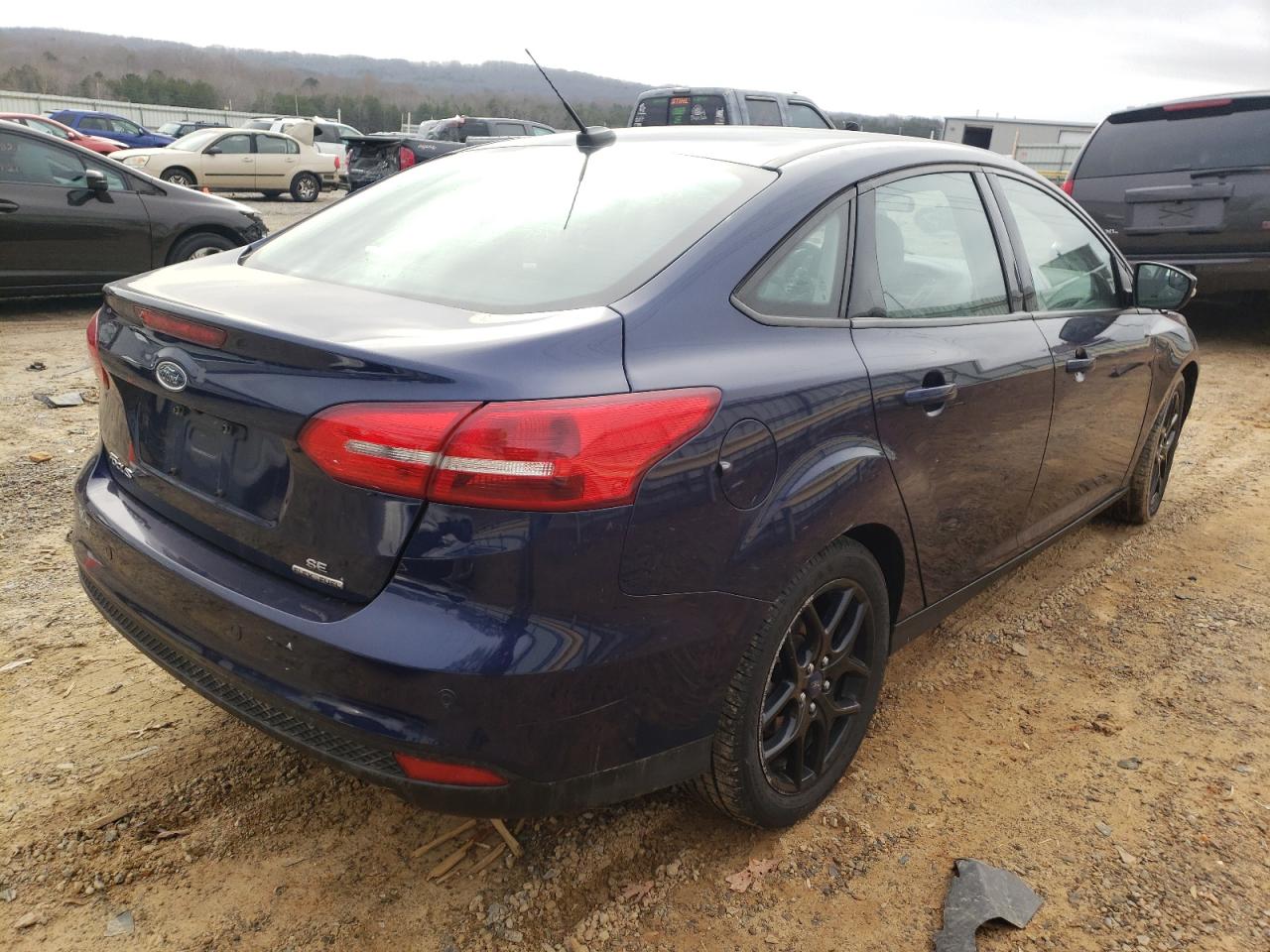Photo 4 from auction – 2016 FORD FOCUS SE with VIN 1FADP3F23GL357422
