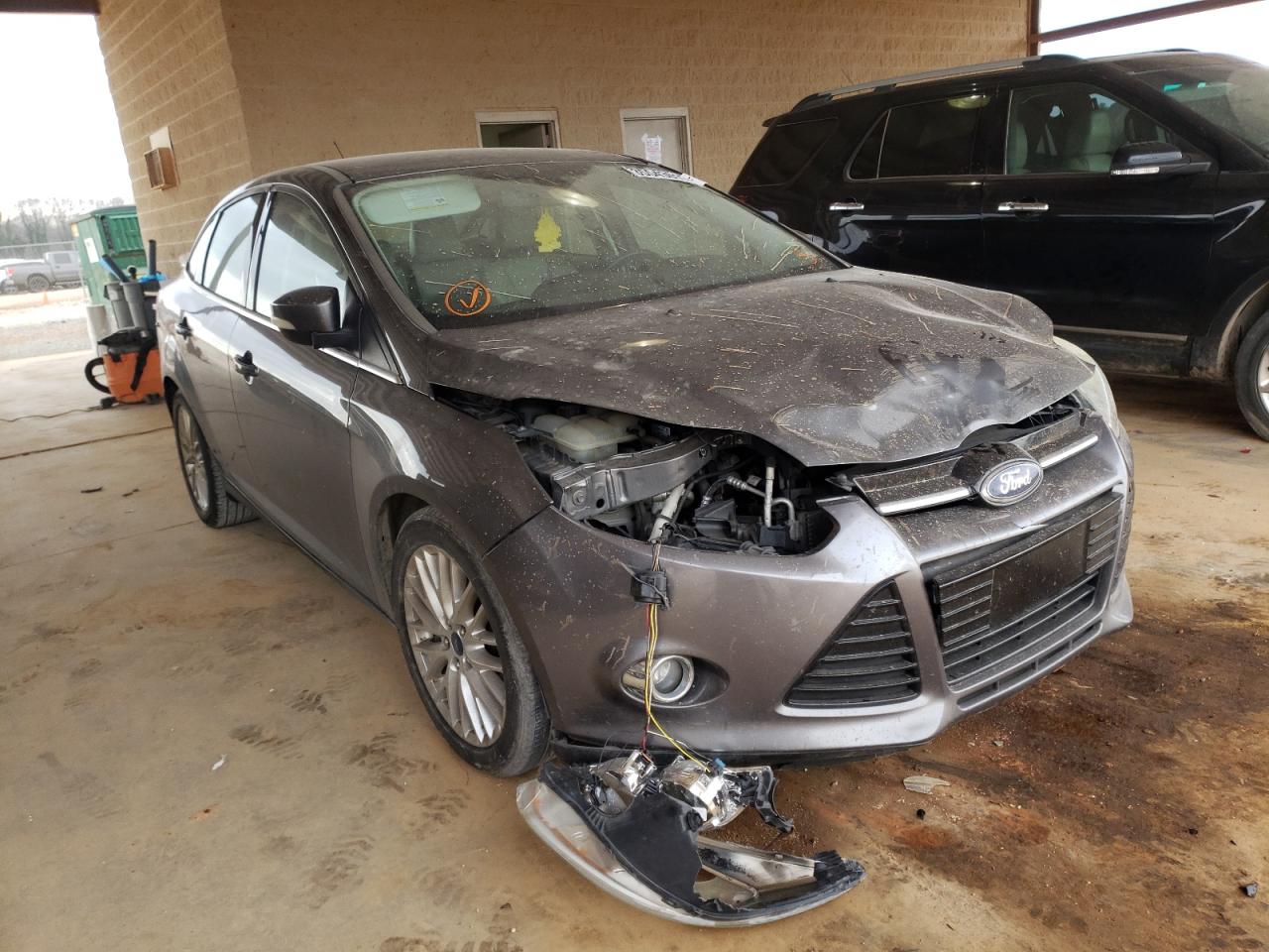FORD FOCUS SEL 2012 with VIN 1FAHP3H29CL321985 - Photo from auction