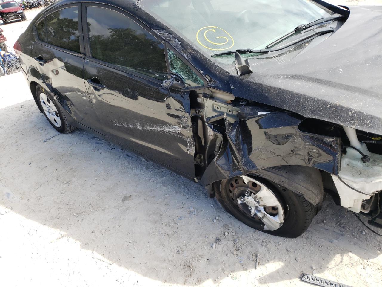 Photo 9 from auction – 2017 KIA FORTE LX with VIN 3KPFK4A79HE104447
