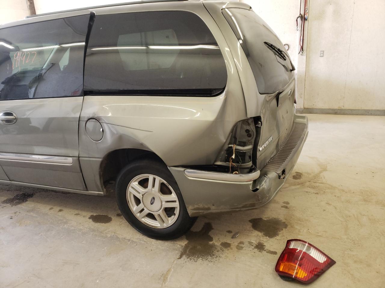 Photo 9 from auction – 2003 FORD WINDSTAR S with VIN 2FMZA52463BA08572