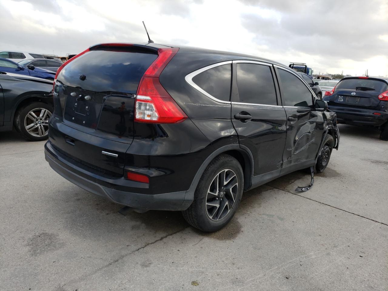 Photo 4 from auction – 2016 HONDA CR-V SE with VIN 2HKRM3H48GH559443