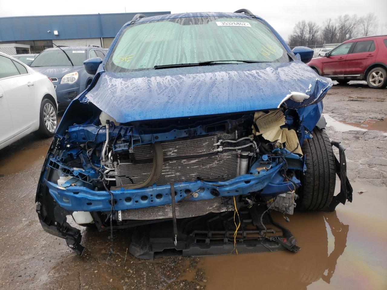 Photo 9 from auction – 2018 FORD ESCAPE SEL with VIN 1FMCU0HD7JUD27929