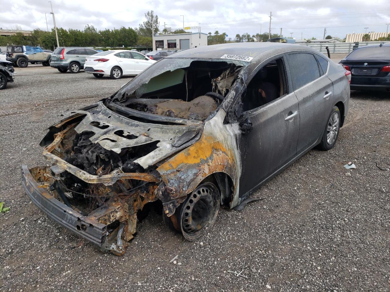 Photo 2 from auction – 2015 NISSAN SENTRA S with VIN 3N1AB7AP1FY290270