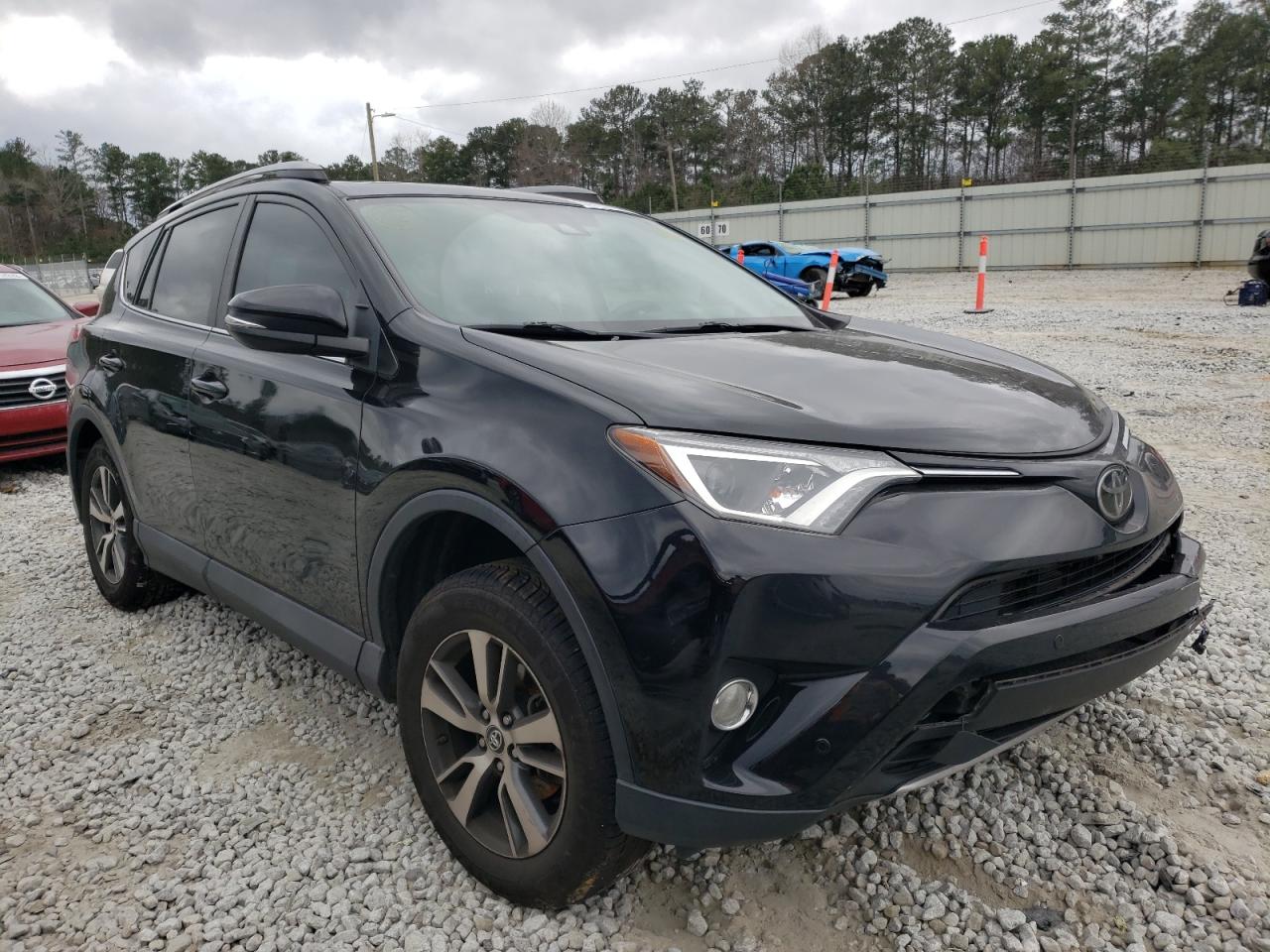 TOYOTA RAV4 ADVEN 2018 with VIN 2T3WFREV0JW419951 - Photo from auction
