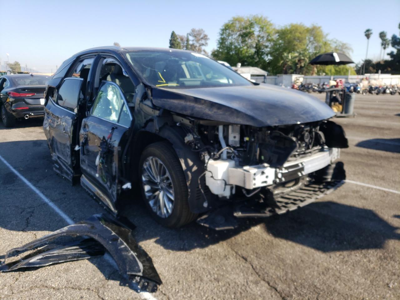 LEXUS RX 450H 2022 with VIN 2T2JGMDA1NC072764 - Photo from auction