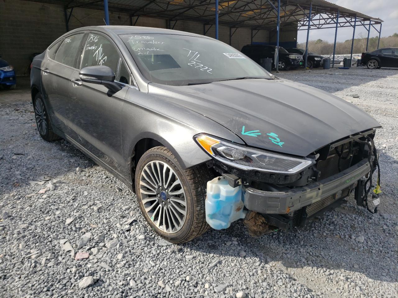 FORD FUSION TIT 2017 with VIN 3FA6P0D98HR243328 - Photo from auction