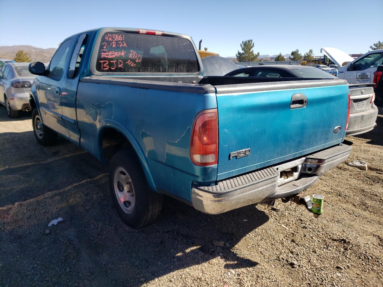 Photo 3 from auction – 1999 FORD F150 with VIN 1FTRX18L2XKA11510